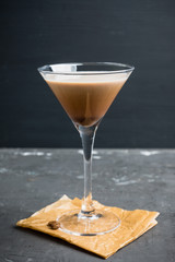 Chocolate martini with spices on the rustic background. Selective focus. Shallow depth of field.