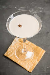 Chocolate martini with spices on the rustic background. Selective focus. Shallow depth of field.