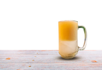 Beer on wooden table isolated on white background