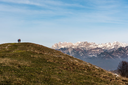 Two persons hinking on the Dolomites Italy