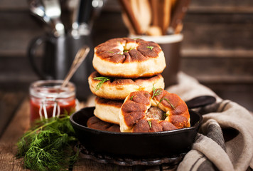 Traditional Russian deep fried meat patties (belyash)