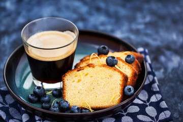 Lemon pound cake slices and cup of coffee
