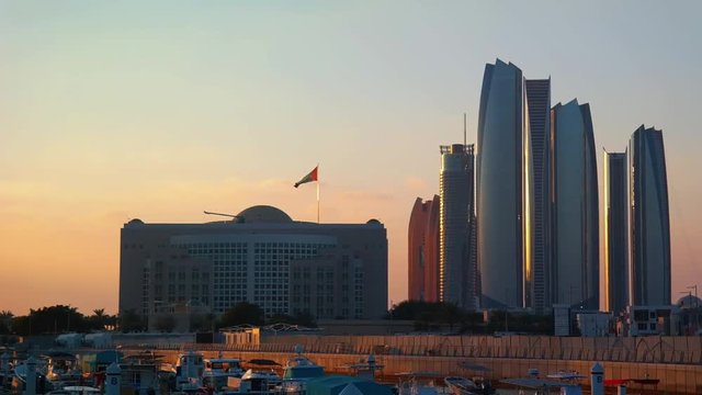 Beautiful view of Abu Dhabi city famous landscape, Etihad Towers, and Marina boats