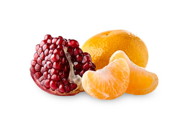 Cut of pomegranate  with mandarin isolated on white background.