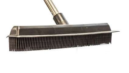 Black Rubber brush, with bristles for cleaning work, photograph with high key, white background