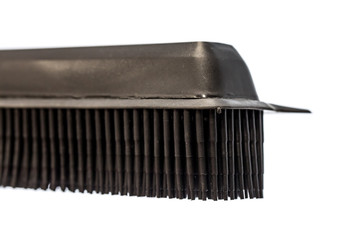 Black Rubber brush, with bristles for cleaning work, photograph with high key, white background