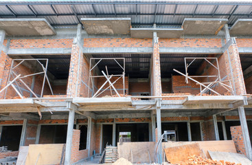 Unfinished commercial buildings are under construction / work in progress