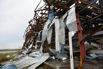 August 2017 Hurricane Harvey major wind damage and destruction to steel framed boat storage building in Rockport. Texas / USA.