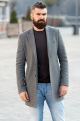 Menswear and male fashion concept. Man bearded hipster stylish fashionable coat. Comfortable and cool. Masculine casual outfit. Hipster outfit. Stylish casual outfit for fall and winter season