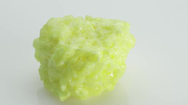 Sulfur or sulphur is a chemical element with symbol S and atomic number 16, from Vesuvius volcano, isolated on a white background, Naples, Italy
