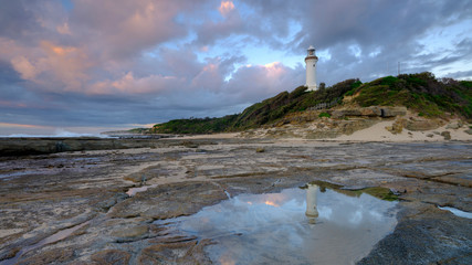 Summer morning golden light on Norah Head Light House, Central Coast, NSW, Australia