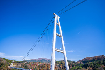 Kuju, oita, Japan, November 11, 2018: Kokonoe Yume Suspension Bridge (otsurihashi), the most highest suspension bridge for walkway in Japan.