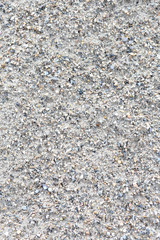 the texture is light gray sand or earth