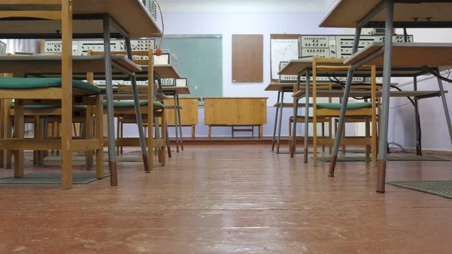 Desks With Electronics Devices For Measurements In Retro Electronics Lab