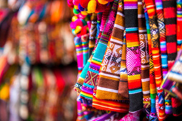 Fototapeta premium Closeup of light striped handbags on the souvenir store in Bolivia