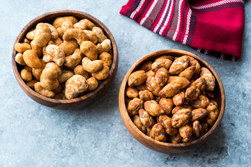 Almond Nuts with Barbeque Sauce and Spicy Cashew with Taco Spice in Wooden Bowl.