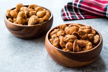 Almond Nuts with Barbeque Sauce and Spicy Cashew with Taco Spice in Wooden Bowl.