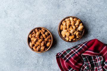 Almond Nuts with Barbeque Sauce and Spicy Cashew with Taco Spice in Wooden Bowl.