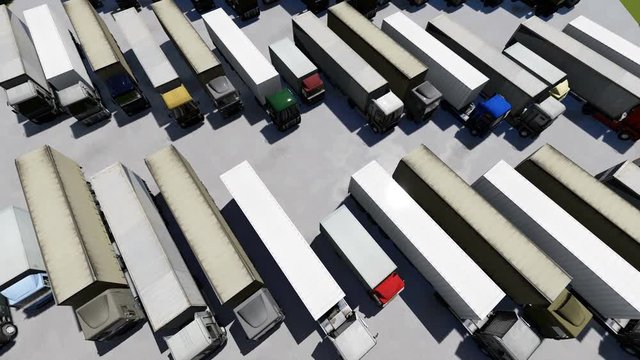 Aerial Top View of Semi Truck with Cargo Trailer Parking with Other Trucks on Special Parking Lot.