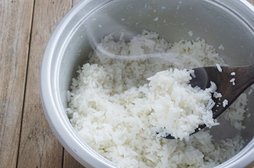 Jasmine rice cooking in electric steam