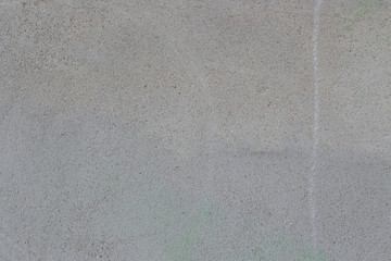 The background of the wall is plastered with cement and sand