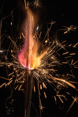 fire and sparks on black background