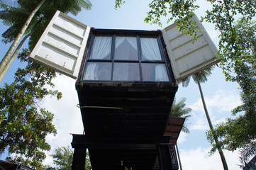A community public building made from refurbish shipping container. Surrounded with beautiful...