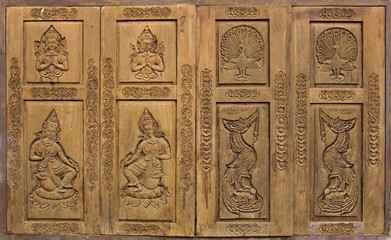 pattern of traditional thai style carved on wood window door