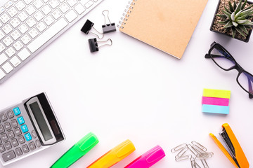 White office desk table with school accessories with office supplies. Top view with copy space