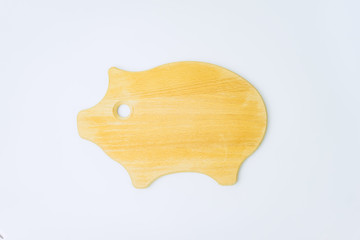Pig wooden cut board.Happy new year 2019 Year of the pig.Zodiac sign with wooden board on white Background.Year of the pig.