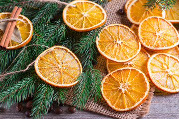 Fototapeta na wymiar Christmas decoration, orange slice, cinnamon
