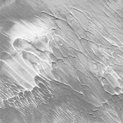 Winter white watercolor texture with abstract washes and brush strokes on white paper background. Trendy look. Chaotic abstract organic design.