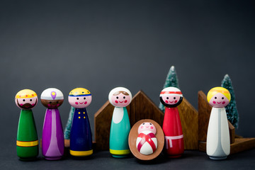 Christmas nativity scene of born child baby Jesus Christ in the manger with Joseph and Mary and Three wise men.Traditional Christmas Nativity Scene of baby Jesus in the manger with Mary and Joseph.