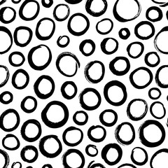 Vector seamless polka dot pattern. Hand drawn vector ornament for wrapping paper.