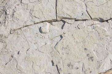 Granular limestone rock surface As background