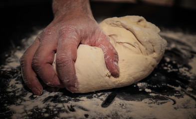 Kneading bread dough by hands
