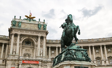 Fototapeta na wymiar Statue in Front of Neue Burg Wing in Hofburg Palace, Vienna, Austria