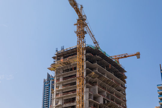 Dubai, UAE - October, 2018. Building construction of new skyscrapers.