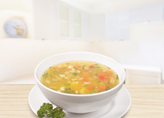 Bowl of delicious vegetables soup on  table