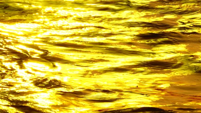 4K golden collor water natere texture backgound