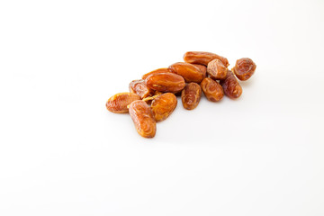 Date fruits over white background