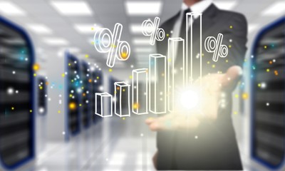 Businessman and analytics symbols on blurred background