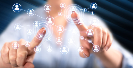 Woman touching a social media network