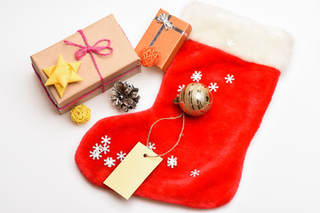 Fill sock with gifts or presents. Contents of christmas stocking. Christmas celebration. Small...
