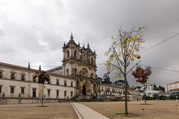 ALCOBACA, PORTUGAL - NOVEMBER 20, 2018: The Alcobaça Monastery is a Roman Catholic church located in the town of Alcobaça,The church and monastery were the first Gothic buildings in Portugal,