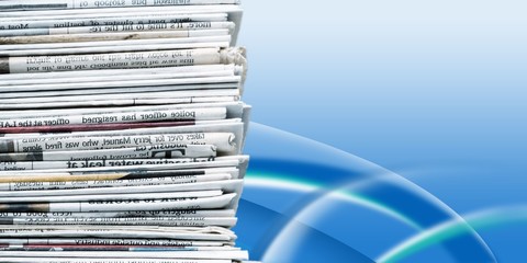Pile of newspapers on background