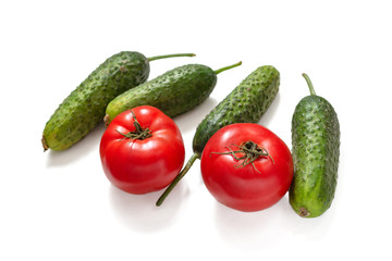 Isolated tomatoes and cucumbers