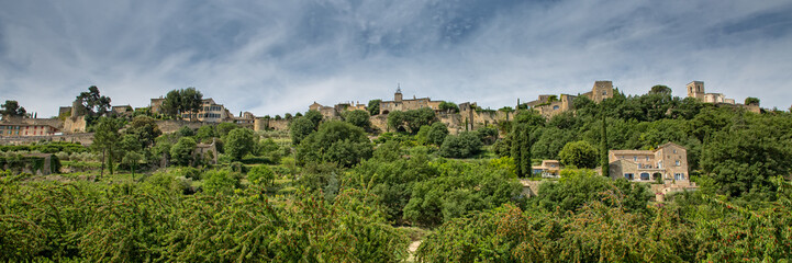 Fototapeta na wymiar Menerbes Peaceful Village of Provence. View of Ménerbes in early summer with cherry trees, Provence, Luberon, Vaucluse, France