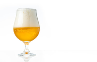 Glass of beer on white background