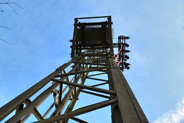 Electric antenna and communication transmitter tower in a german landscape